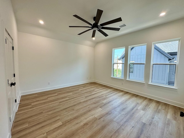 1637 Beall St, Houston, TX 77008 - spare room featuring light wood-style floors, a ceiling fan, recessed lighting, and baseboards
