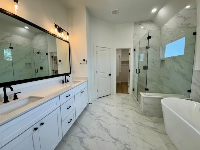 1637 Beall St, Houston, TX 77008 - full bathroom featuring marble look tiles, a marble finish shower, double vanity, a freestanding bath, and a walk in closet
