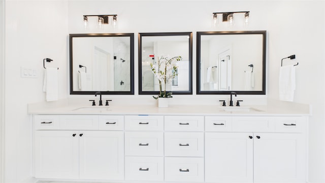 1637 Beall St, Houston, TX 77008 - bathroom featuring a shower stall and double vanity