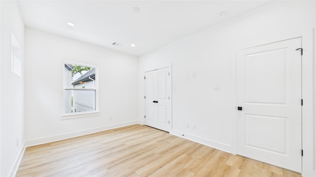 1637 Beall St, Houston, TX 77008 - spare room featuring light wood-style floors and recessed lighting