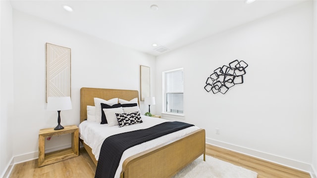 1637 Beall St, Houston, TX 77008 - bedroom with light wood-style floors and recessed lighting