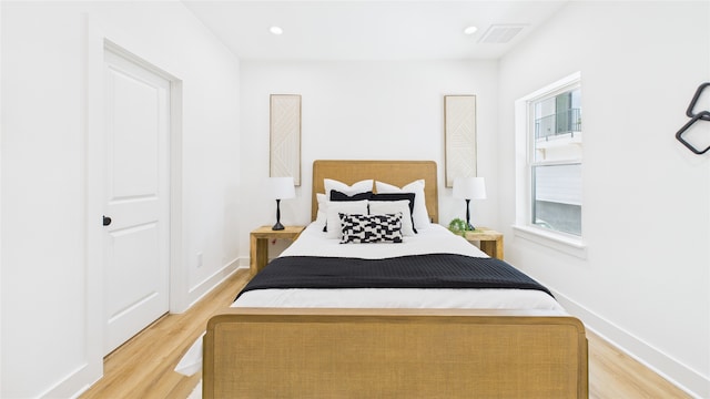 1637 Beall St, Houston, TX 77008 - bedroom with light wood-style floors and baseboards
