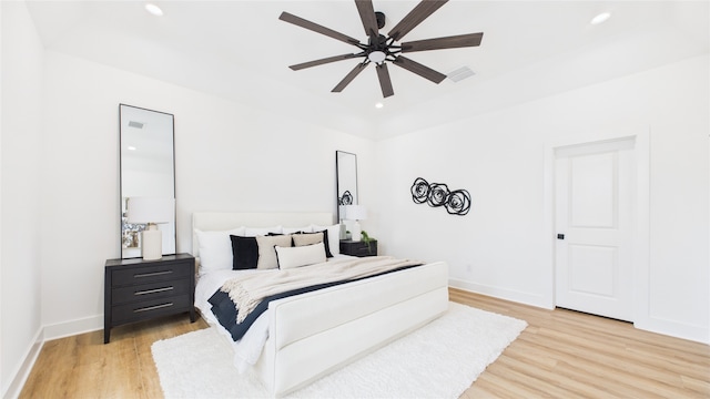 1637 Beall St, Houston, TX 77008 - bedroom with light wood finished floors, recessed lighting, and ceiling fan