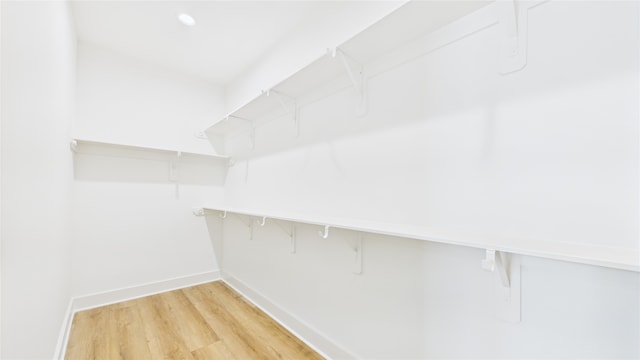 1637 Beall St, Houston, TX 77008 - walk in closet with light wood finished floors
