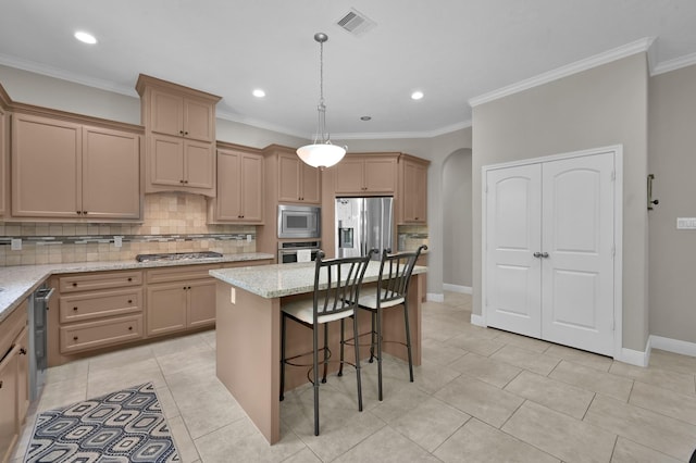 281 Berkley Dr, Montgomery, TX 77356 - kitchen featuring stainless steel appliances, backsplash, light tile patterned floors, arched walkways, and crown molding