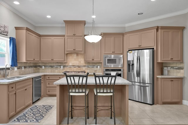 281 Berkley Dr, Montgomery, TX 77356 - kitchen featuring appliances with stainless steel finishes, a kitchen island, decorative backsplash, light tile patterned flooring, and ornamental molding
