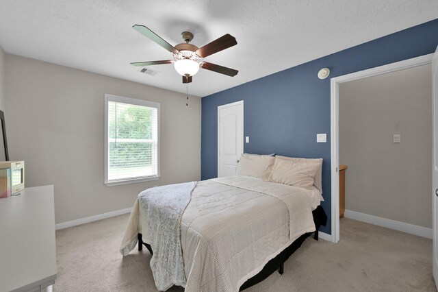 281 Berkley Dr, Montgomery, TX 77356 - carpeted bedroom featuring baseboards and a ceiling fan