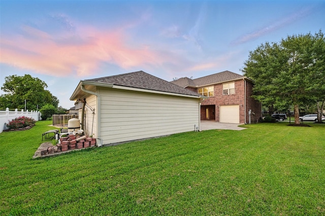 3602 Lindhaven Dr, Pearland, TX 77584 - back of property with a garage, driveway, and roof with shingles