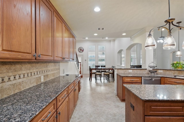 3602 Lindhaven Dr, Pearland, TX 77584 - kitchen with backsplash, stainless steel dishwasher, brown cabinetry, recessed lighting, and crown molding