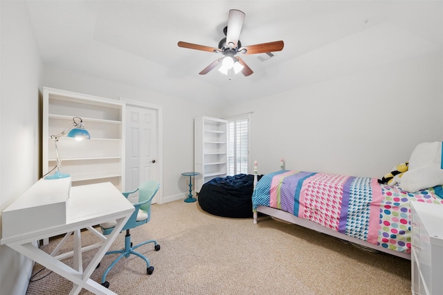 3602 Lindhaven Dr, Pearland, TX 77584 - carpeted bedroom with a tray ceiling, a ceiling fan, and an office area