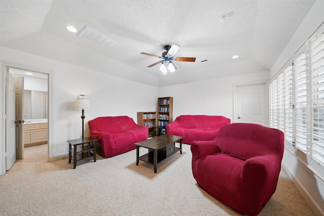 3602 Lindhaven Dr, Pearland, TX 77584 - living area with light carpet, a textured ceiling, a ceiling fan, recessed lighting, and baseboards