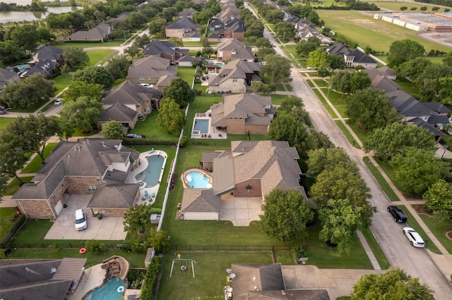 3602 Lindhaven Dr, Pearland, TX 77584 - aerial overview of property's location featuring a pool and nearby suburban area