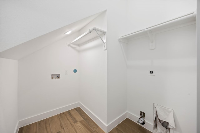 4923 Golden Forest Dr, Houston, TX 77091 - washroom with hookup for a washing machine, hookup for an electric dryer, wood finished floors, and baseboards
