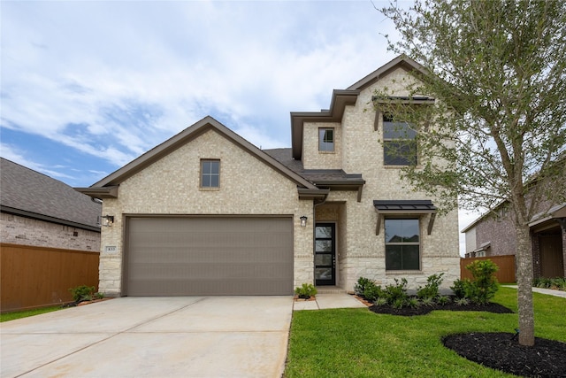 833 Laguna Green Ln, Katy, TX 77493 - view of front of home with concrete driveway, stone siding, an attached garage, and a shingled roof