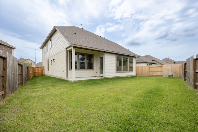 833 Laguna Green Ln, Katy, TX 77493 - back of house with a patio and a shingled roof