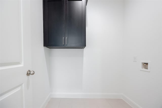 833 Laguna Green Ln, Katy, TX 77493 - laundry area featuring cabinet space, hookup for a washing machine, and baseboards