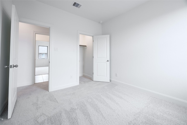 833 Laguna Green Ln, Katy, TX 77493 - unfurnished bedroom featuring carpet, baseboards, and a spacious closet