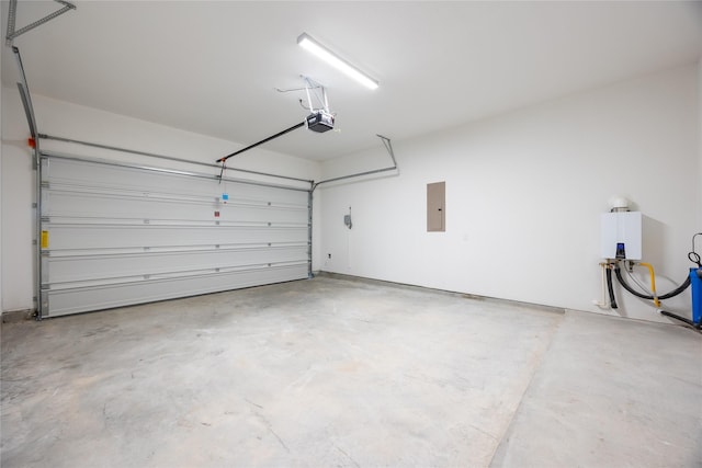 833 Laguna Green Ln, Katy, TX 77493 - garage featuring electric panel and a garage door opener