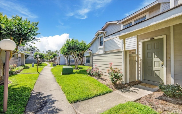 6103 Ludington Dr Unit 4-941, Houston, TX 77035 - entrance to property featuring a lawn