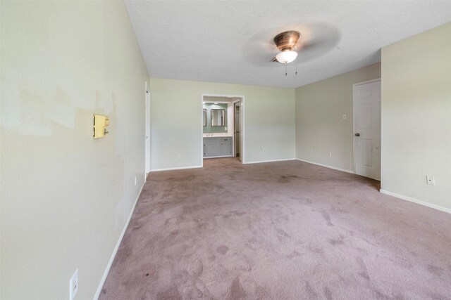 31302 Wisteria Rd, Magnolia, TX 77355 - carpeted empty room with ceiling fan and baseboards