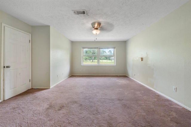31302 Wisteria Rd, Magnolia, TX 77355 - empty room featuring a ceiling fan, carpet flooring, and a textured ceiling