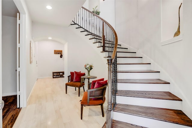 1348 W 25th St, Houston, TX 77008 - stairway featuring recessed lighting, wood finished floors, and baseboards