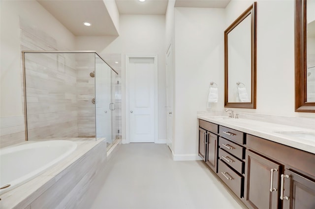 1348 W 25th St, Houston, TX 77008 - full bathroom with a stall shower, a bath, double vanity, and baseboards