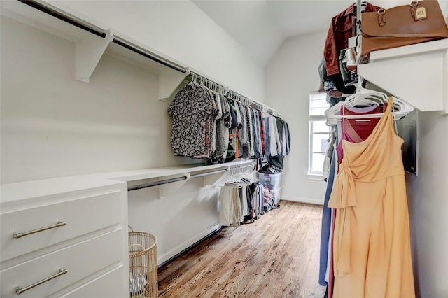 1348 W 25th St, Houston, TX 77008 - spacious closet featuring lofted ceiling and light wood-style floors