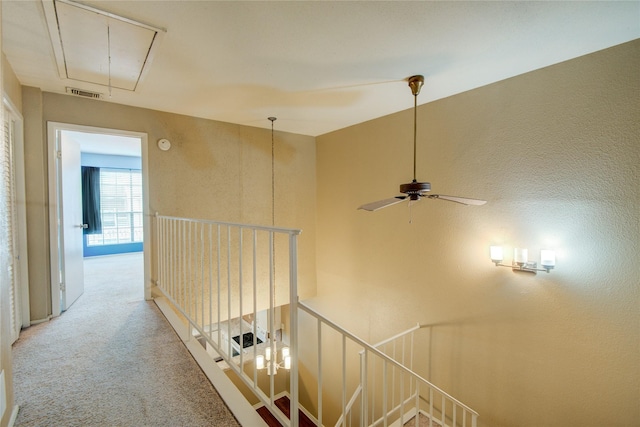 14911 Wunderlich Dr Unit 1007, Houston, TX 77069 - hallway featuring attic access, an upstairs landing, and light carpet