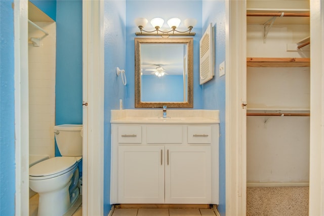 14911 Wunderlich Dr Unit 1007, Houston, TX 77069 - full bathroom featuring vanity, a walk in closet, and toilet