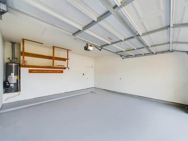 5631 Winsome Ln, Houston, TX 77057 - garage with water heater and a garage door opener