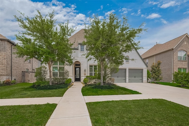 2206 Umber Oaks Ln, Brookshire, TX 77423 - view of front of home featuring a garage and driveway