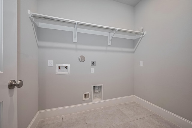 2206 Umber Oaks Ln, Brookshire, TX 77423 - laundry area featuring hookup for an electric dryer, hookup for a gas dryer, hookup for a washing machine, and baseboards