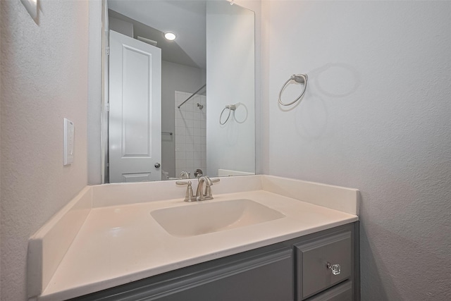 2206 Umber Oaks Ln, Brookshire, TX 77423 - bathroom featuring vanity and a textured wall