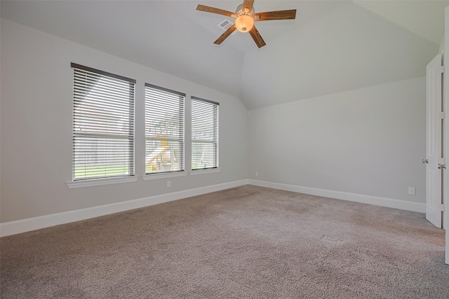 2206 Umber Oaks Ln, Brookshire, TX 77423 - additional living space with vaulted ceiling, a ceiling fan, baseboards, and light carpet