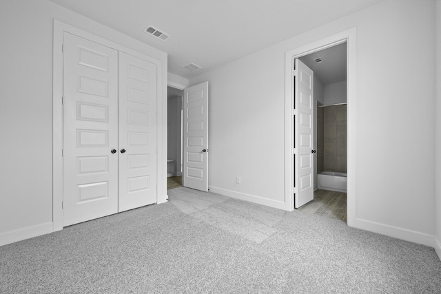 30419 Bermuda Hallow Bnd, Fulshear, TX 77423 - unfurnished bedroom featuring carpet, baseboards, a closet, and ensuite bathroom