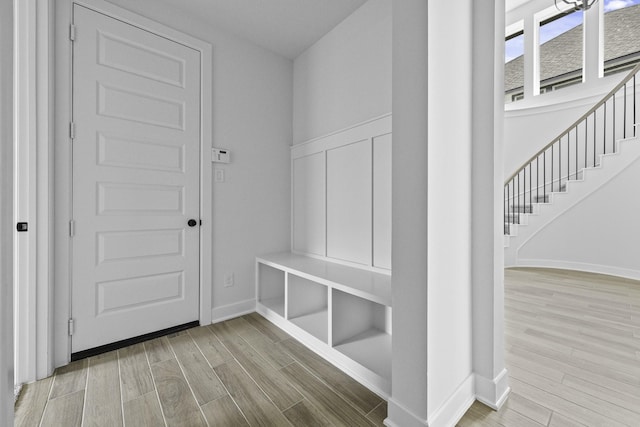 30419 Bermuda Hallow Bnd, Fulshear, TX 77423 - mudroom featuring wood finished floors and baseboards