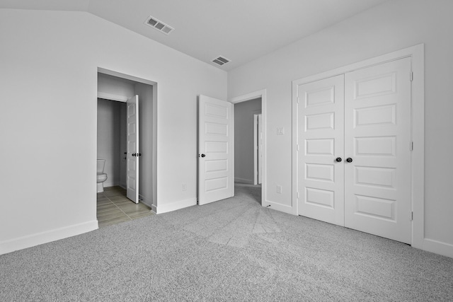 30419 Bermuda Hallow Bnd, Fulshear, TX 77423 - unfurnished bedroom with carpet, a closet, baseboards, and ensuite bath
