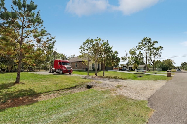 311 W Independence Dr, League City, TX 77573 - view of front facade featuring a front yard