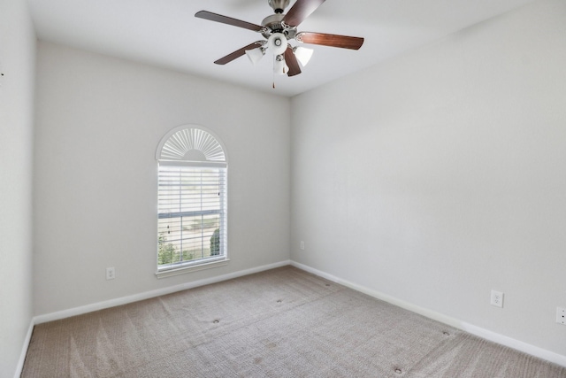 311 W Independence Dr, League City, TX 77573 - carpeted empty room with baseboards and a ceiling fan