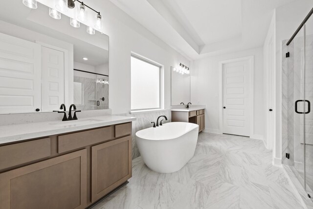 5041 Steady Breeze Dr, Katy, TX 77493 - bathroom with a stall shower, two vanities, a soaking tub, and marble look tile flooring