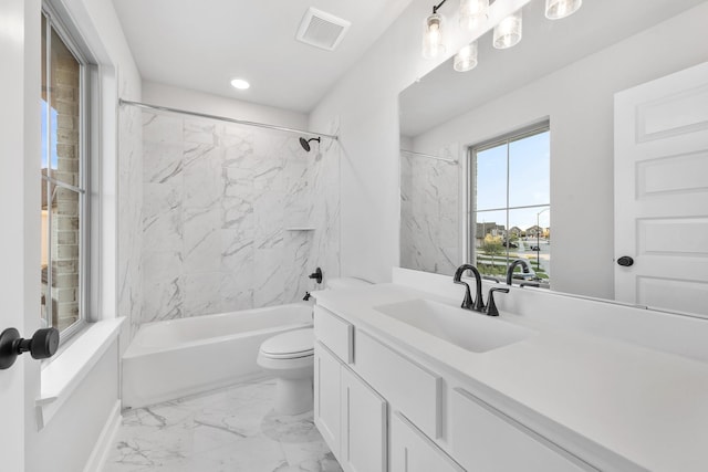 24727 Lobelia Garden Ln, Katy, TX 77493 - full bathroom featuring vanity, bathing tub / shower combination, toilet, marble look tile flooring, and recessed lighting