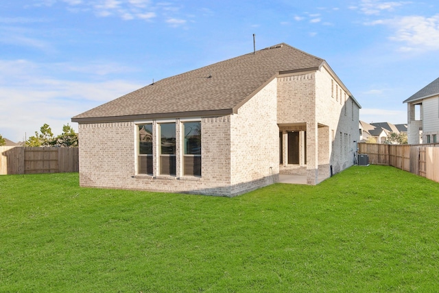 24727 Lobelia Garden Ln, Katy, TX 77493 - rear view of house featuring cooling unit, brick siding, and roof with shingles