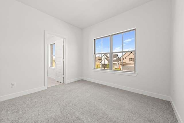 24718 Harrow Meadow Dr, Katy, TX 77493 - empty room with light carpet and baseboards