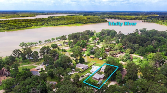 200 Cove View Dr, Trinity, TX 75862 - aerial view of property and surrounding area with a heavily wooded area, a large body of water, and property boundaries highlighted