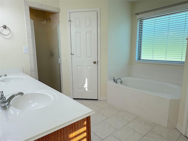 23315 Mystery St, Huffman, TX 77336 - bathroom featuring tile patterned flooring, a garden tub, double vanity, and a shower