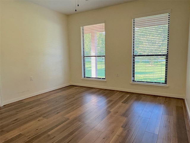 23315 Mystery St, Huffman, TX 77336 - empty room with wood finished floors and baseboards