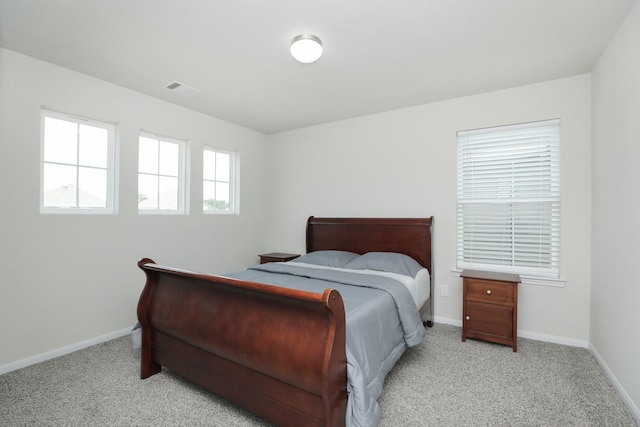 2221 Forest Chestnut Dr, Spring, TX 77386 - bedroom featuring light colored carpet and baseboards
