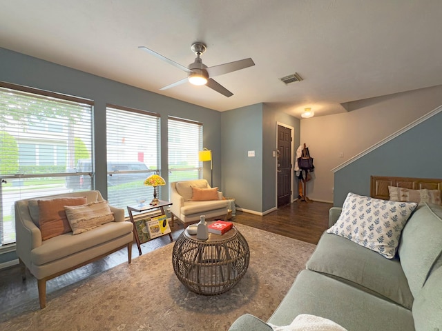 1919 Bailey St, Houston, TX 77006 - living area with wood finished floors, ceiling fan, and baseboards