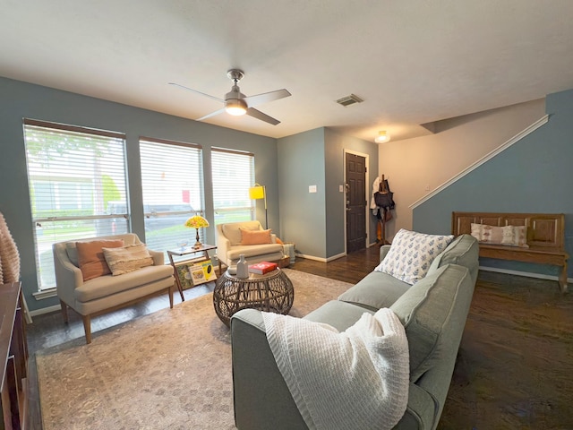 1919 Bailey St, Houston, TX 77006 - living area featuring wood finished floors, ceiling fan, and baseboards